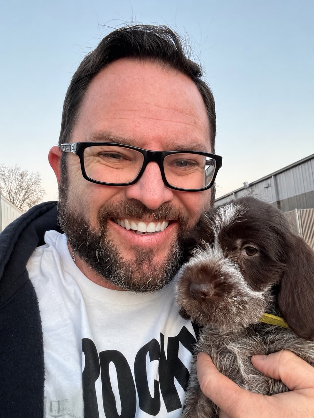 Chris Renfro and the family puppy